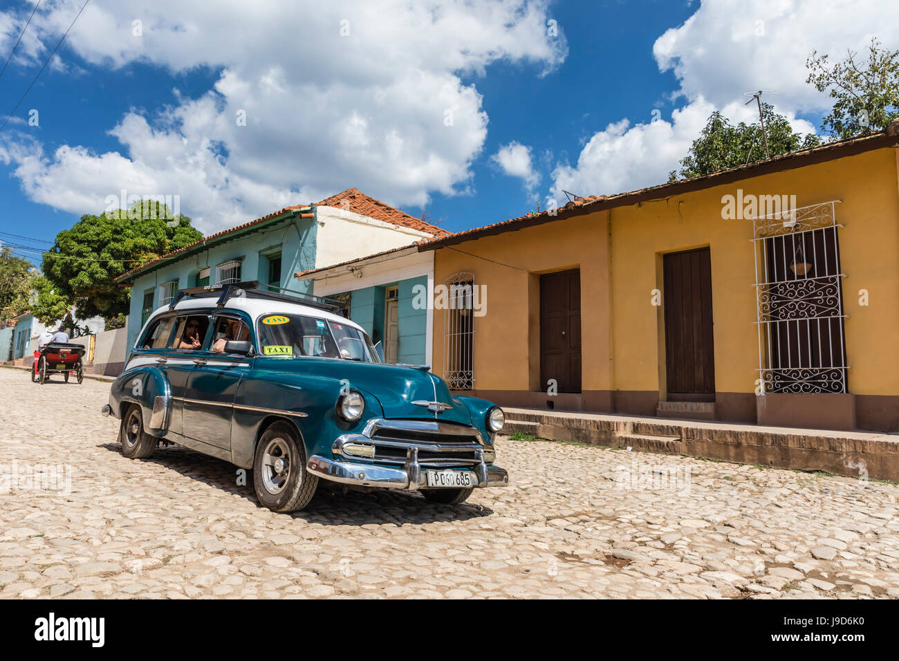 Ein Jahrgang 1950 amerikanisches Auto als ein Taxi in die Stadt von Trinidad, UNESCO, Kuba, West Indies, Karibik Stockfoto