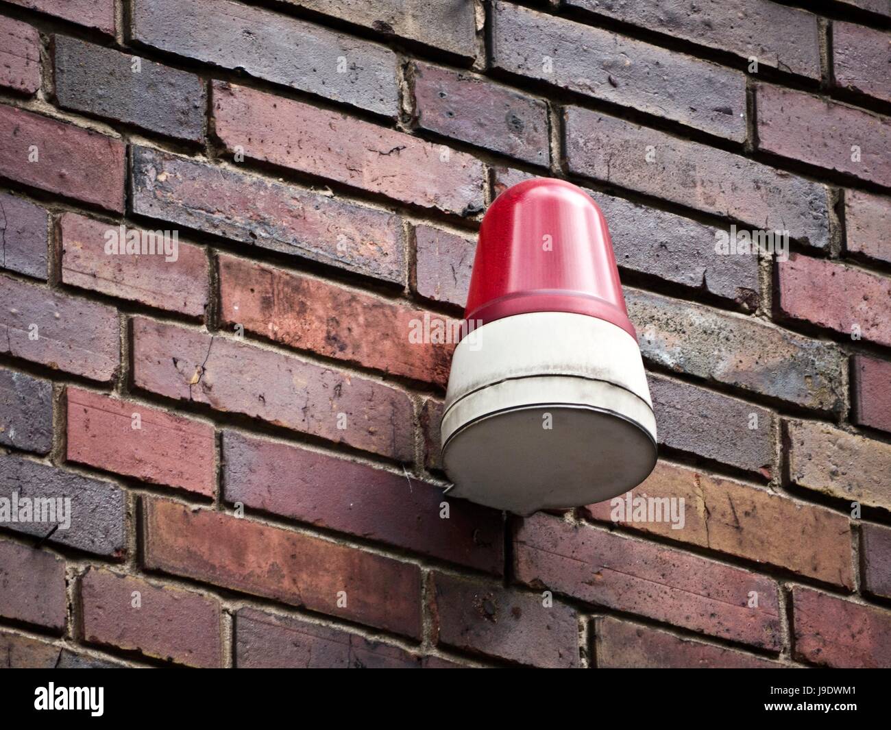 Alarmgeraet Red Brick wall Stockfoto