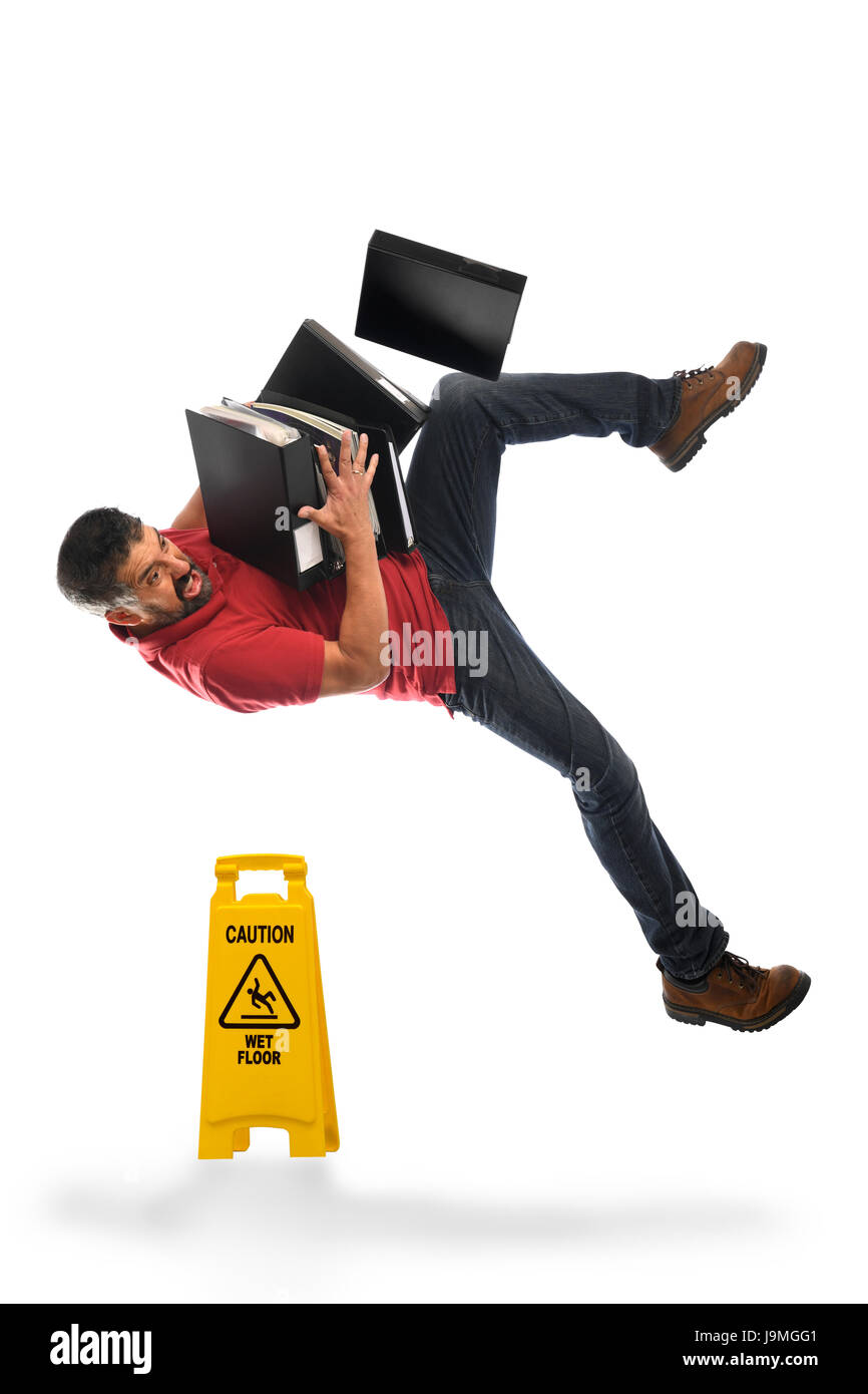 Geschäftsmann fallen auf nassen Boden isoliert auf weißem Hintergrund Stockfoto