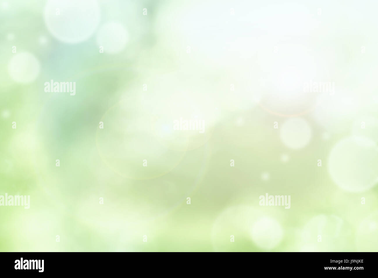 Hellen abstrakten Hintergrund verschwommen runden grünen Bokeh Kreise für Sommer Hintergründe. Stockfoto