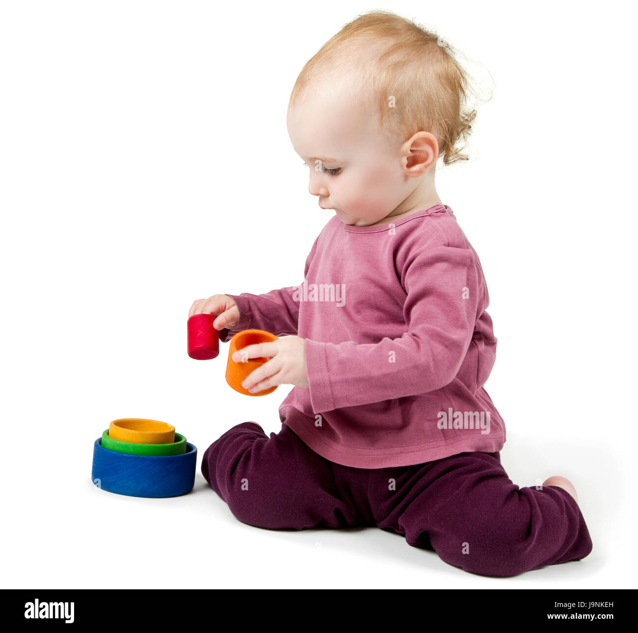 kleines Kind mit bunten Klötzchen spielen Stockfoto