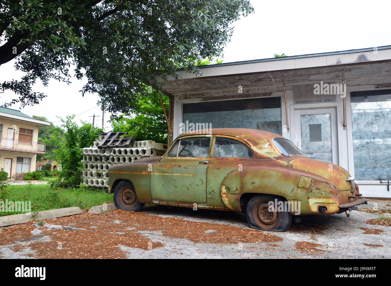Eine klassische grüne und rostigen alten Chevrolet in Austin Texas geparkt Stockfoto