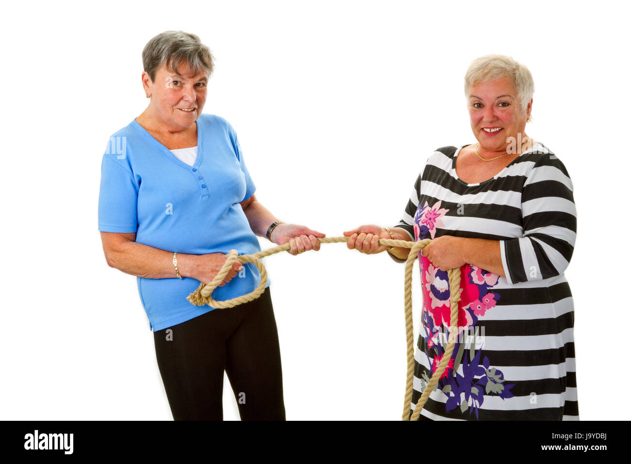 Senioren ziehen zusammen Stockfoto