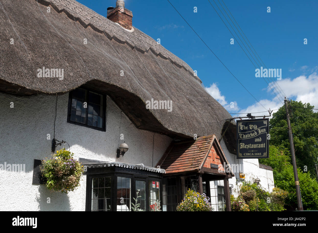 Die alte reetgedeckte Inn, Adstock, Buckinghamshire, England, UK Stockfoto