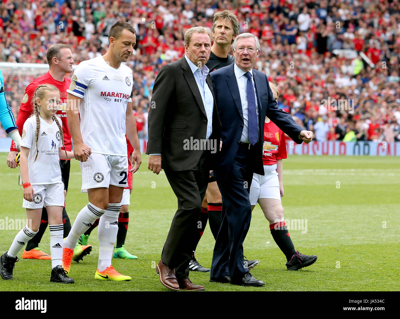 John Terry links (), Harry Redknapp (Mitte) und Sir Alex Ferguson (rechts) gehen Sie vor Michael Carrick Testimonial Match im Old Trafford, Manchester. Stockfoto