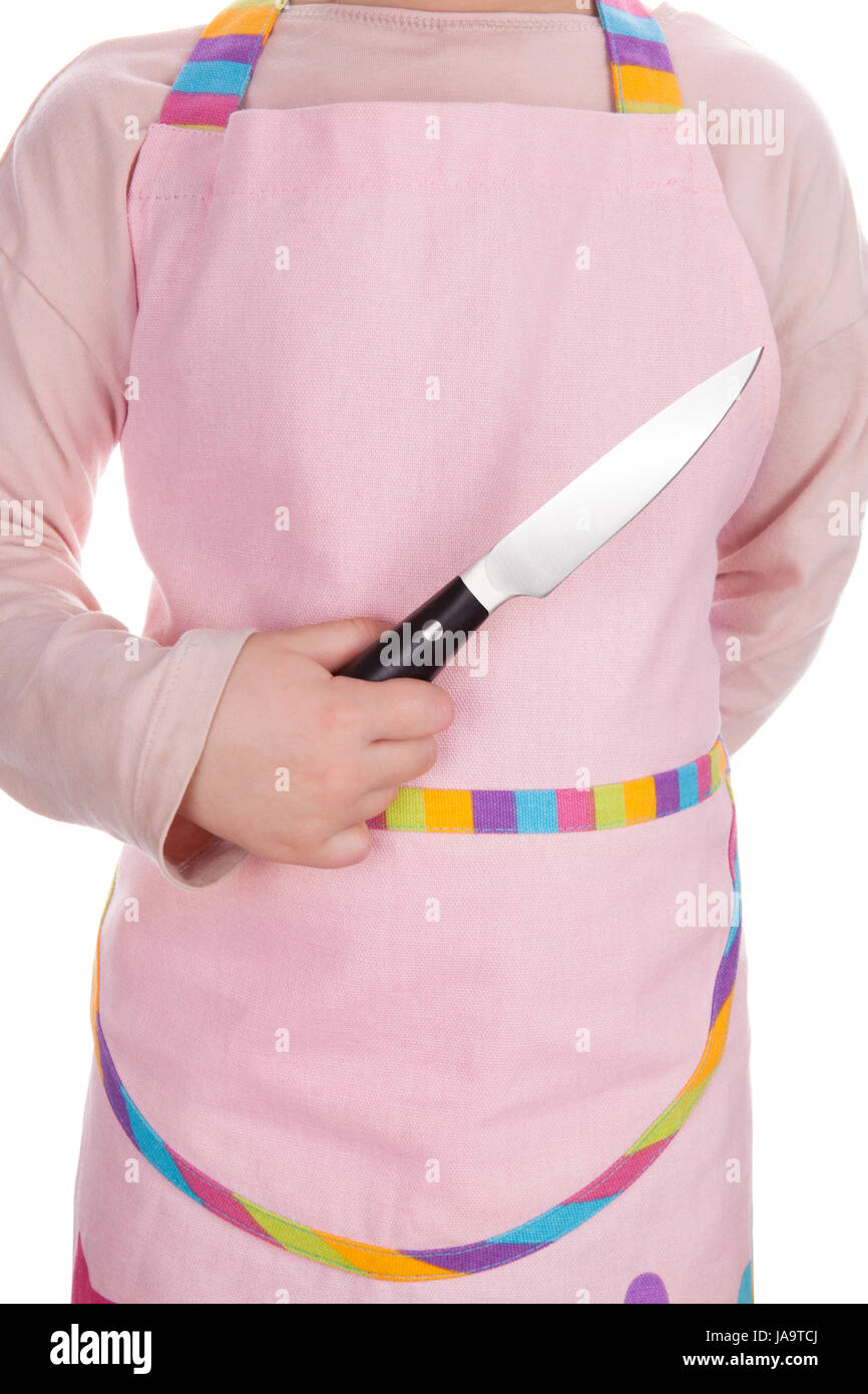 Junges Mädchen Koch in rosa tablier holding Küchenmesser isoliert auf weißem Hintergrund. Traumjob-Konzept. Stockfoto