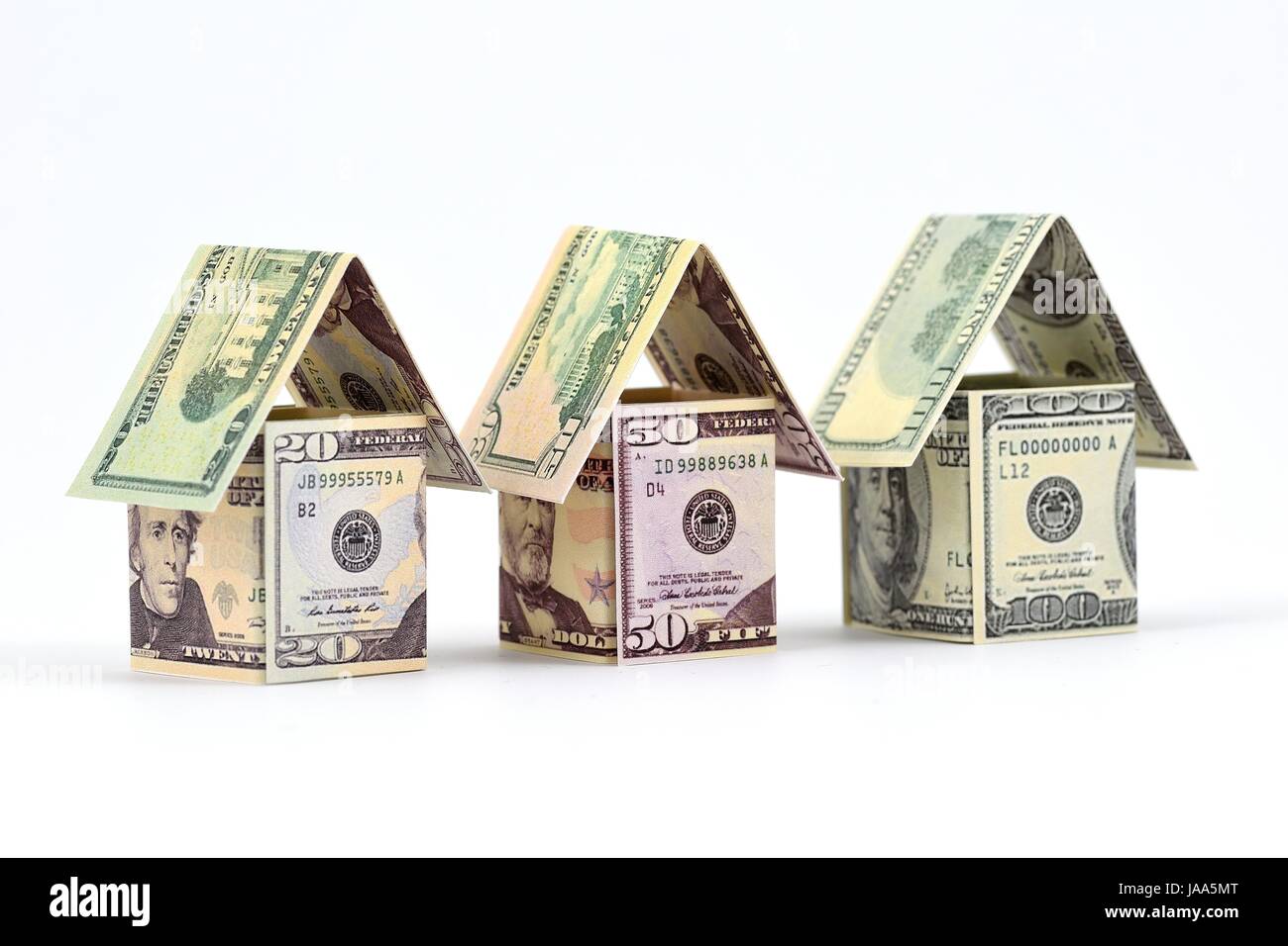 Wohnungsmarkt, eine erfolgreiche Zukunft. Immobilien nutzen. Material: Banknoten. Stockfoto
