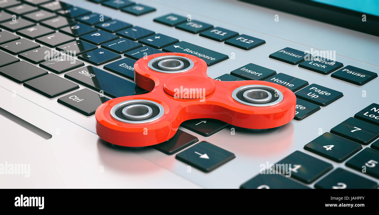 Spielzeug zum Stressabbau. Zappeln Sie Spinner isoliert auf einem Laptop. 3D illustration Stockfoto