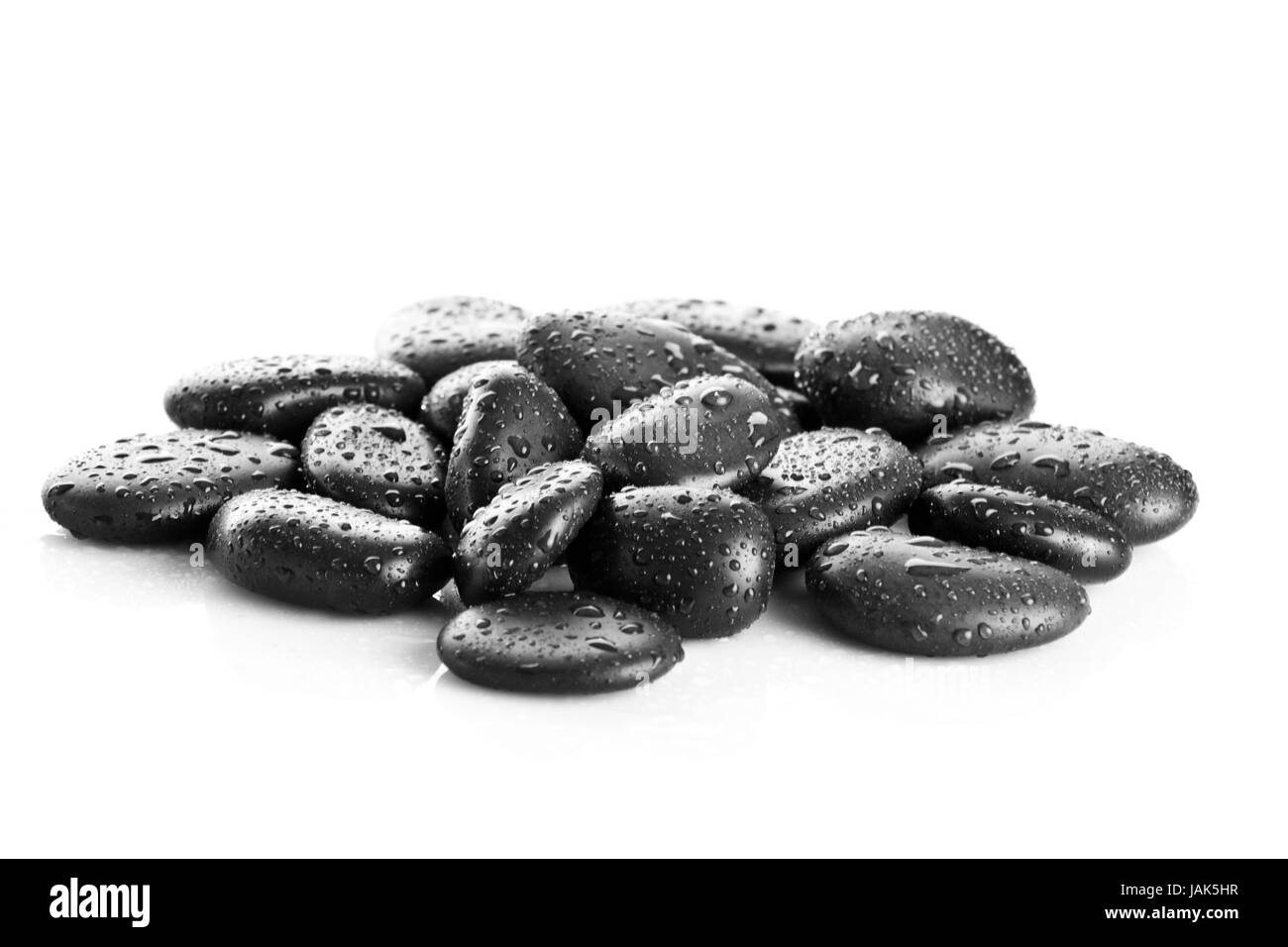 Schwarze Massage Steinen isoliert Stockfoto