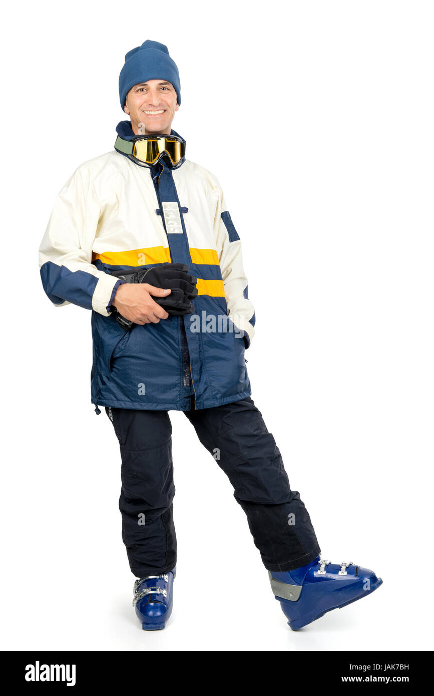 Skifahrer in voller Montur isoliert in weiß Stockfoto