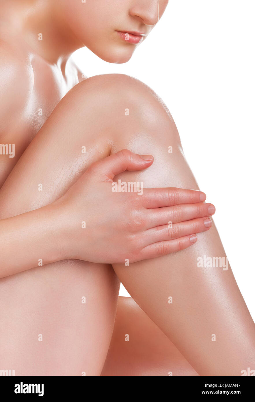Pflege für weibliche Beine isoliert auf weißem Hintergrund Stockfoto