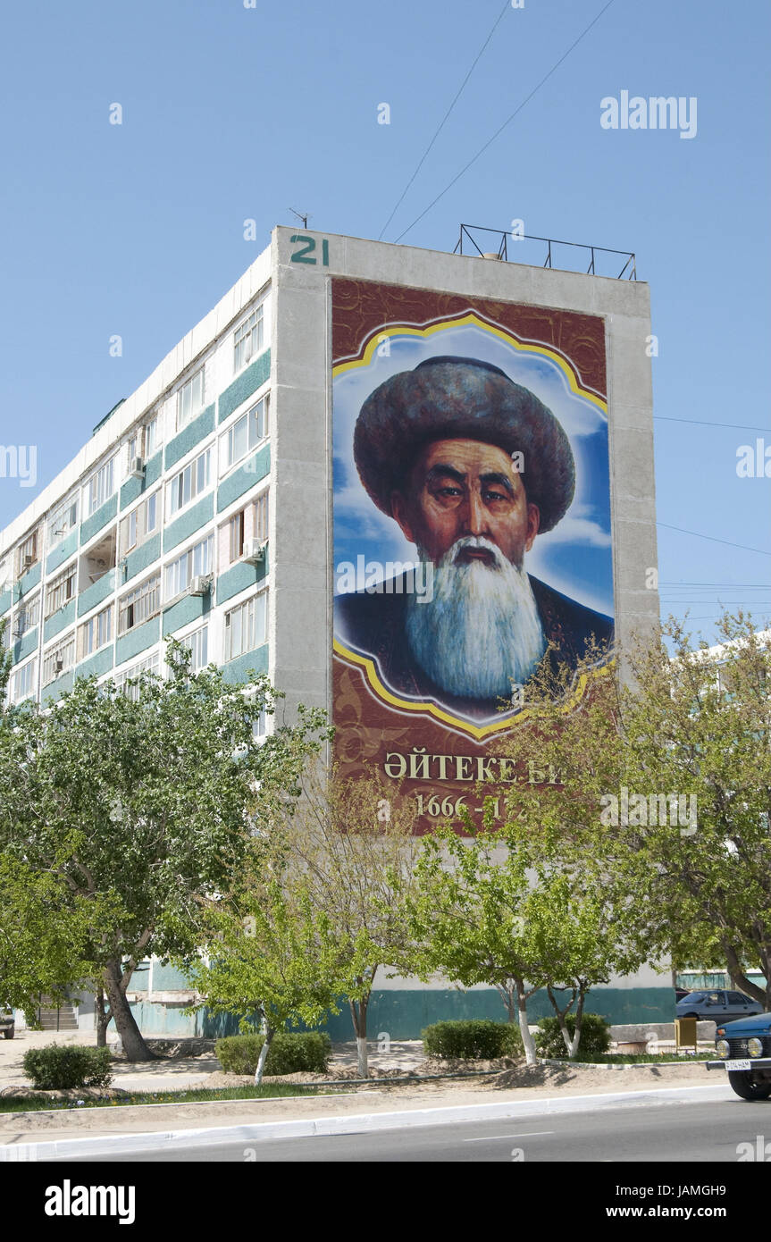 Kasachstan, Aktau, Straßenszene mit Propaganda Bild im Haus Fassade, Stockfoto