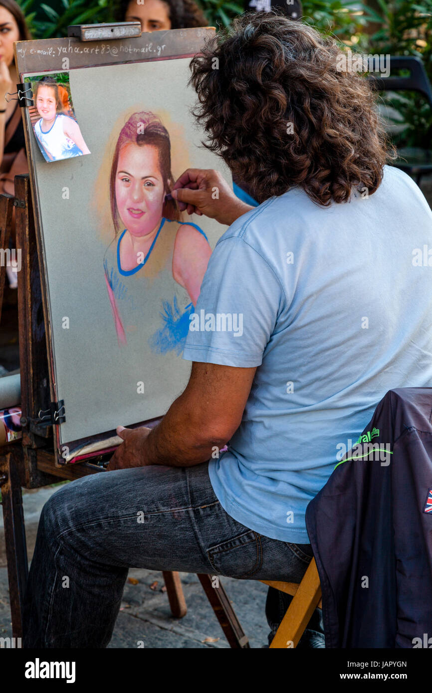 Ein lokaler Künstler zeichnen ein Porträt, Altstadt von Rhodos, Rhodos, Griechenland Stockfoto