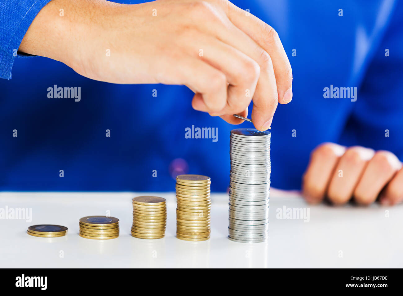 Geschäftsmann Börse Münze Graph Wachstum Stockfoto