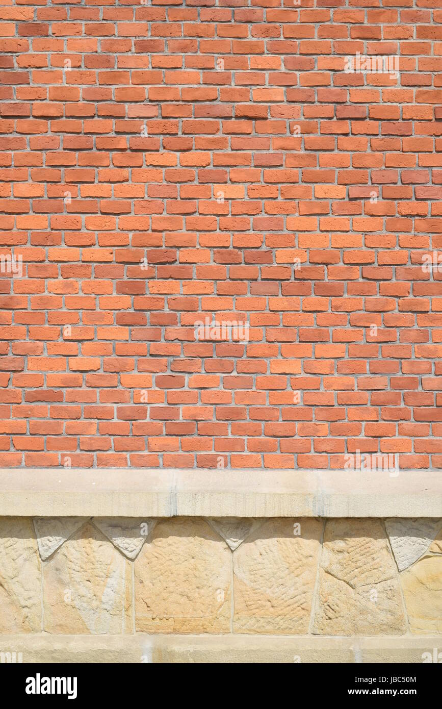 Aus rotem Backstein und Sandstein Mauer Hintergrund Stockfoto