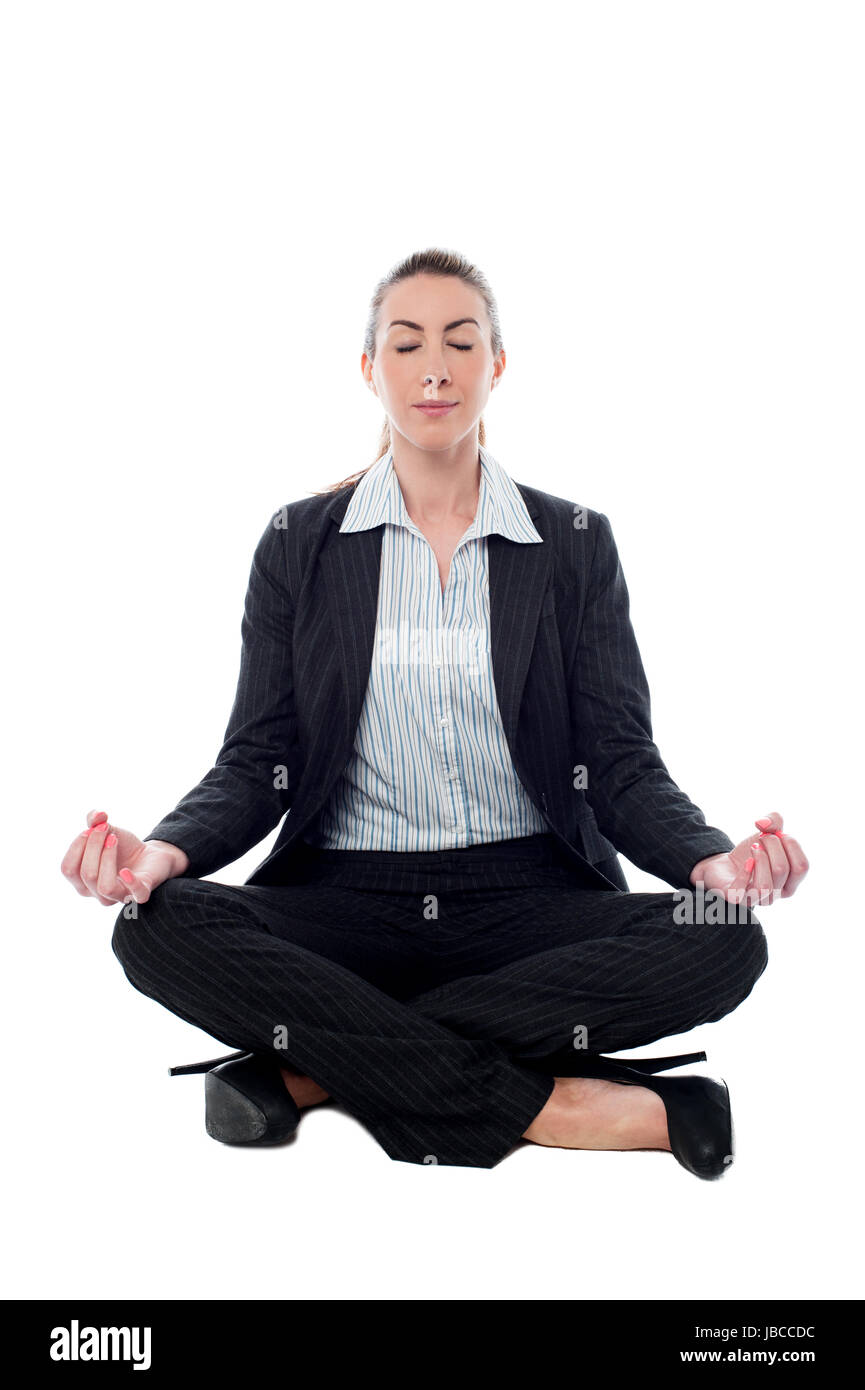 Geschäftsfrau meditieren im Lotus-Haltung Stockfoto