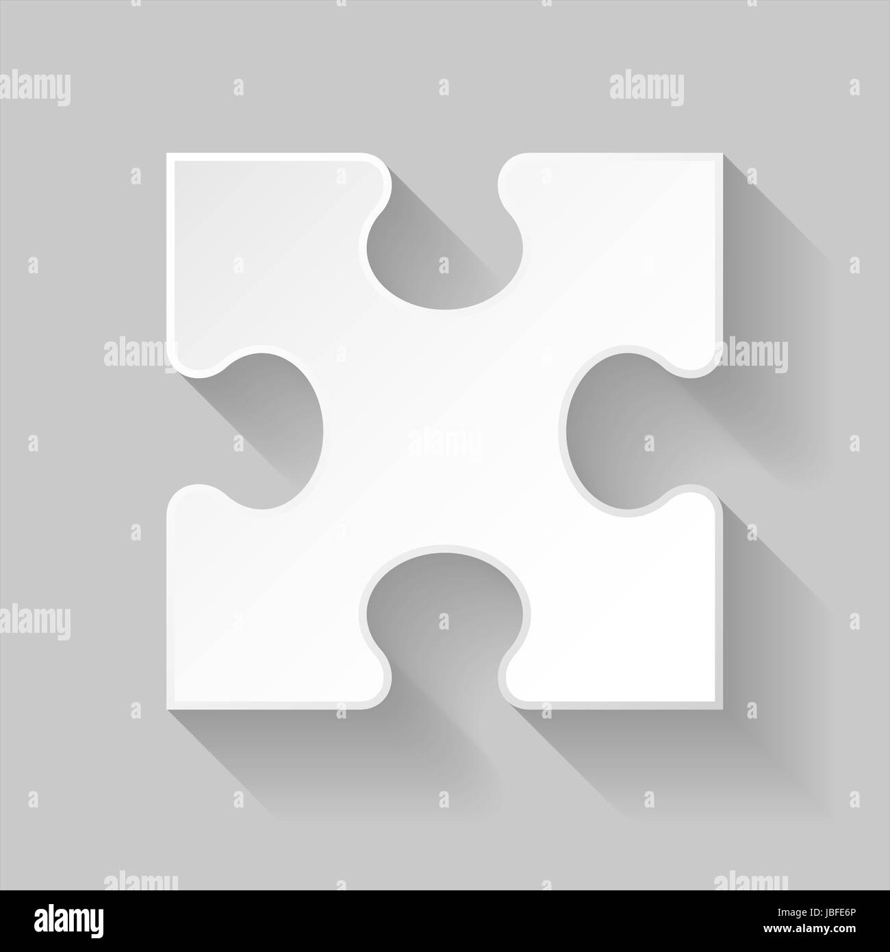 Weiße Puzzle Detail mit langen Schatten auf grauem Hintergrund Stockfoto