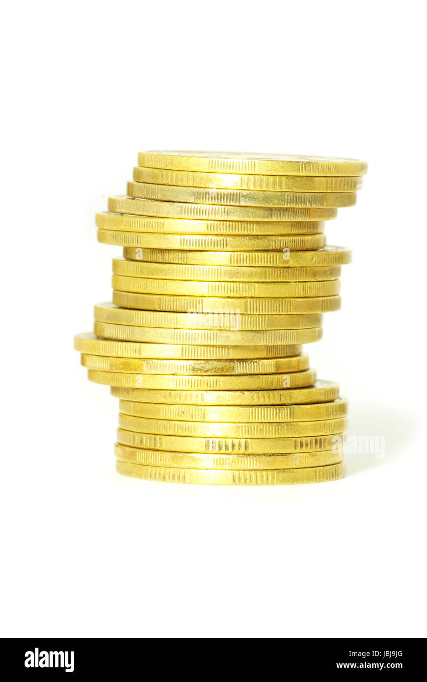 Vorrat an Münzen isoliert auf eine weiße Stockfoto