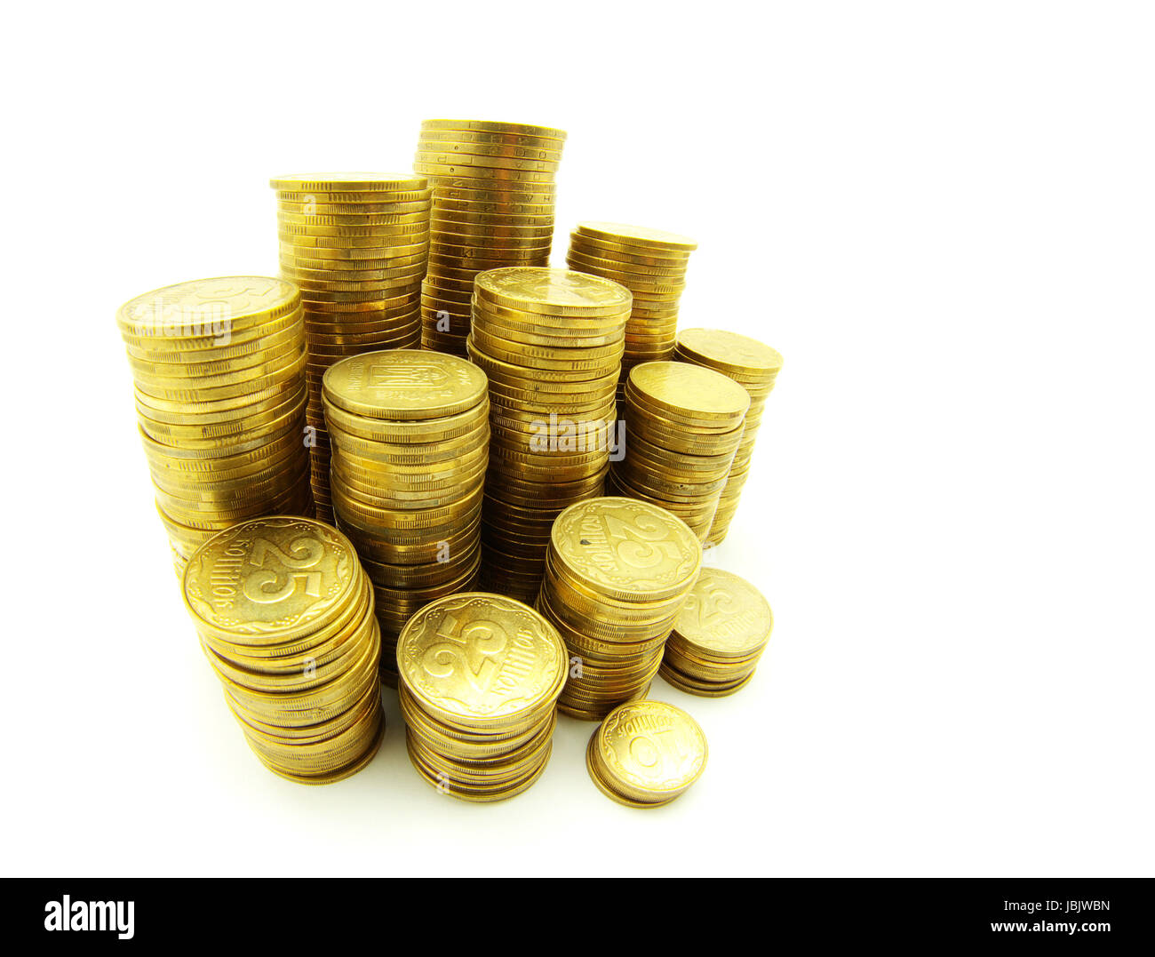 Vorrat an Münzen isoliert auf eine weiße Stockfoto