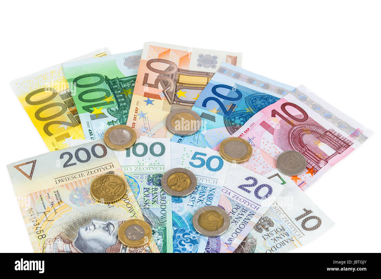 Euro und neue polnische Zloty Geldscheine mit Münzen isoliert auf weißem Hintergrund mit Beschneidungspfad Stockfoto