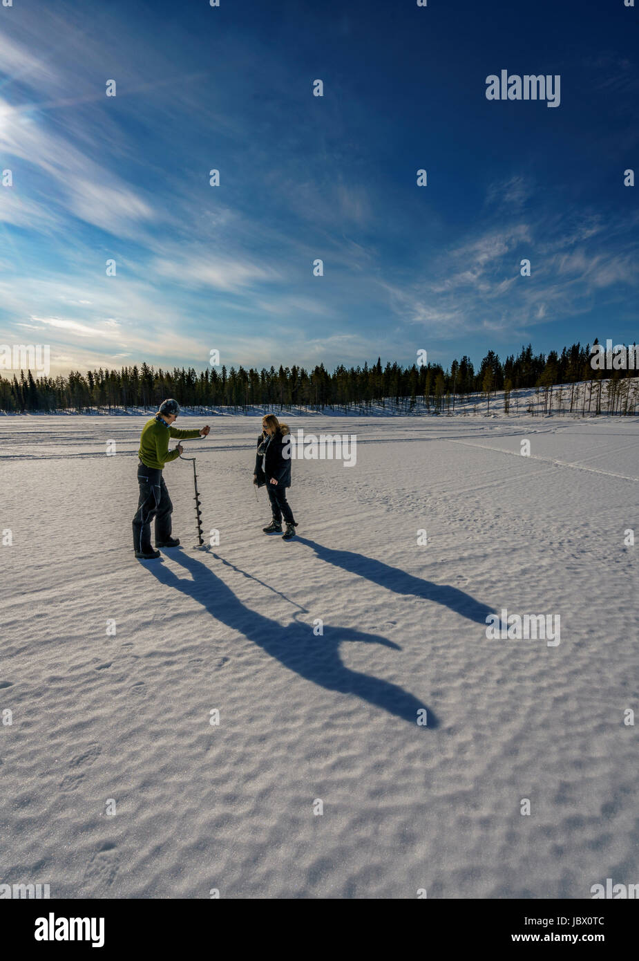 Eis Angeln, Kangos, Lappland, Schweden Stockfoto