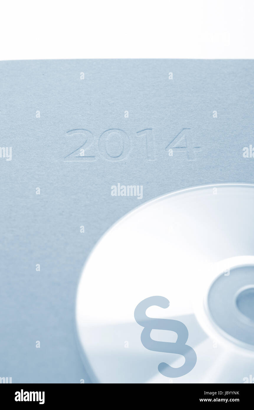 CD mit einem Absatz Symbol auf einen Kalender 2014 Stockfoto