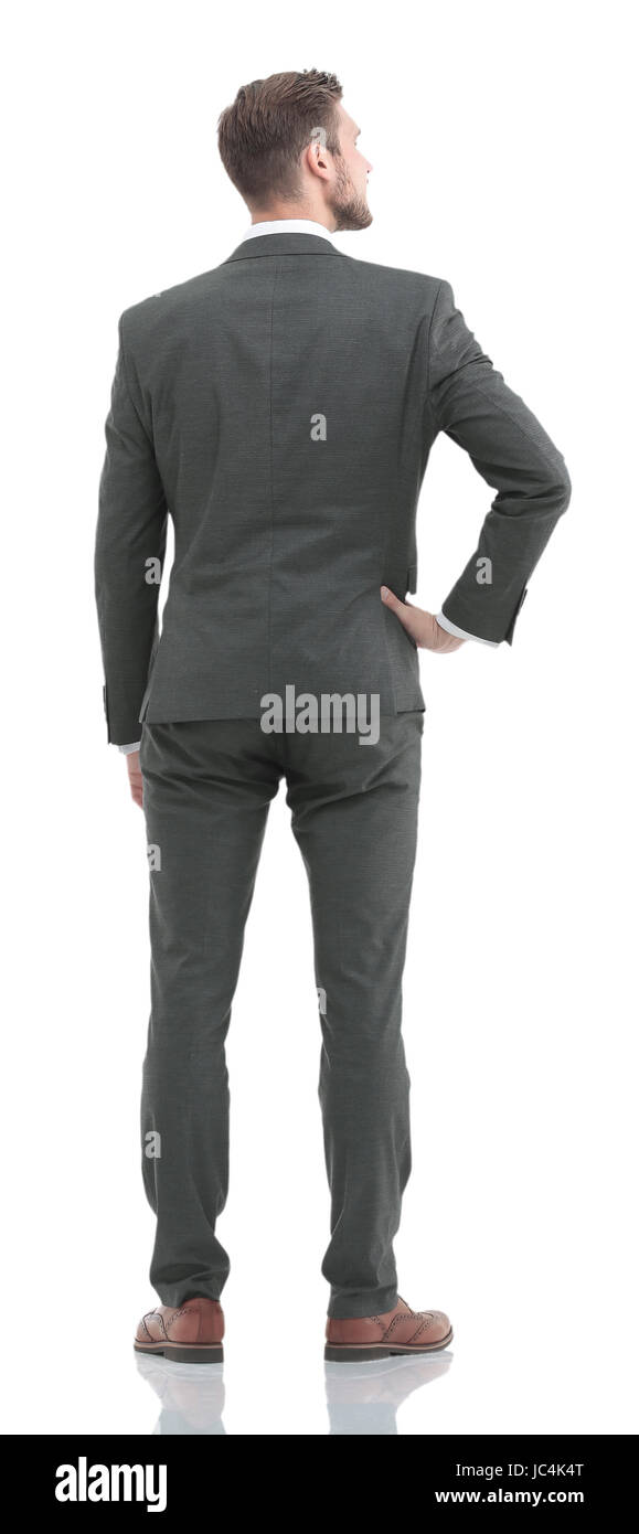 Geschäftsmann im Anzug von der Rückseite - Blick auf etwas über Stockfoto
