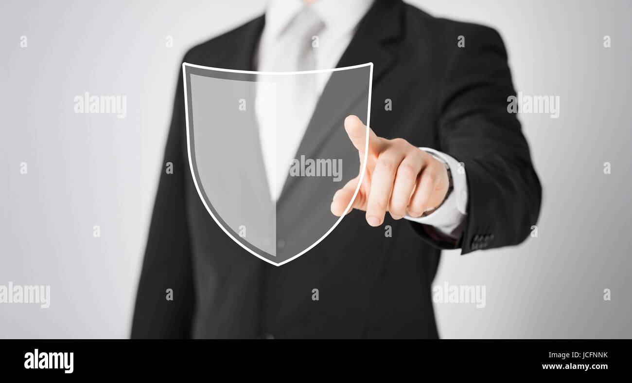 Mann Zeigefinger auf antivirus-Programm-Symbol Stockfoto