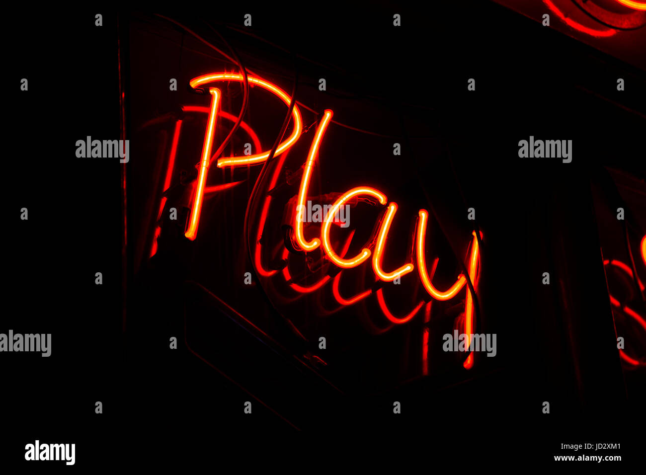 Glühende spielen Leuchtreklame Stockfoto