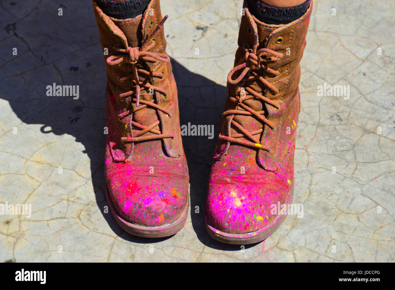 Farbe auf meine Stiefel Stockfoto