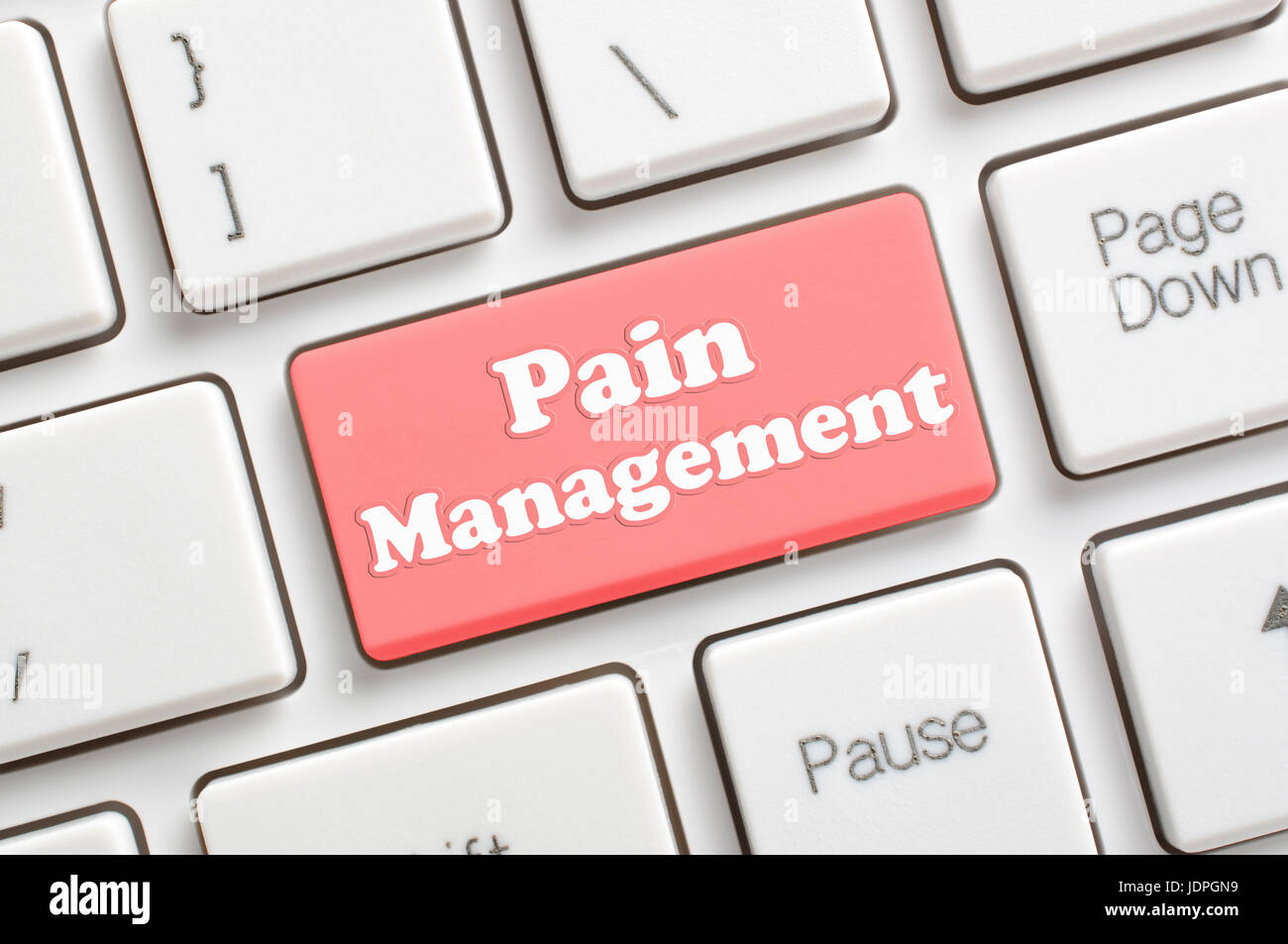 Rote Schmerzen Management Taste auf der Tastatur Stockfoto