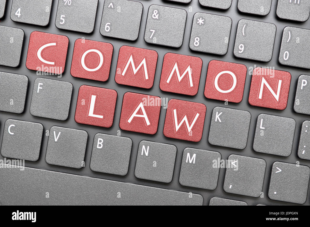 Rote Common-Law-Taste auf der Tastatur Stockfoto