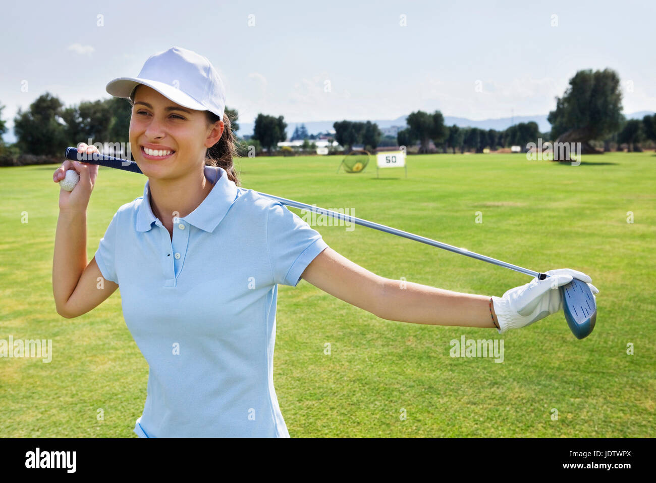 Porträt eines jungen weiblichen Golf Spieler Stockfoto