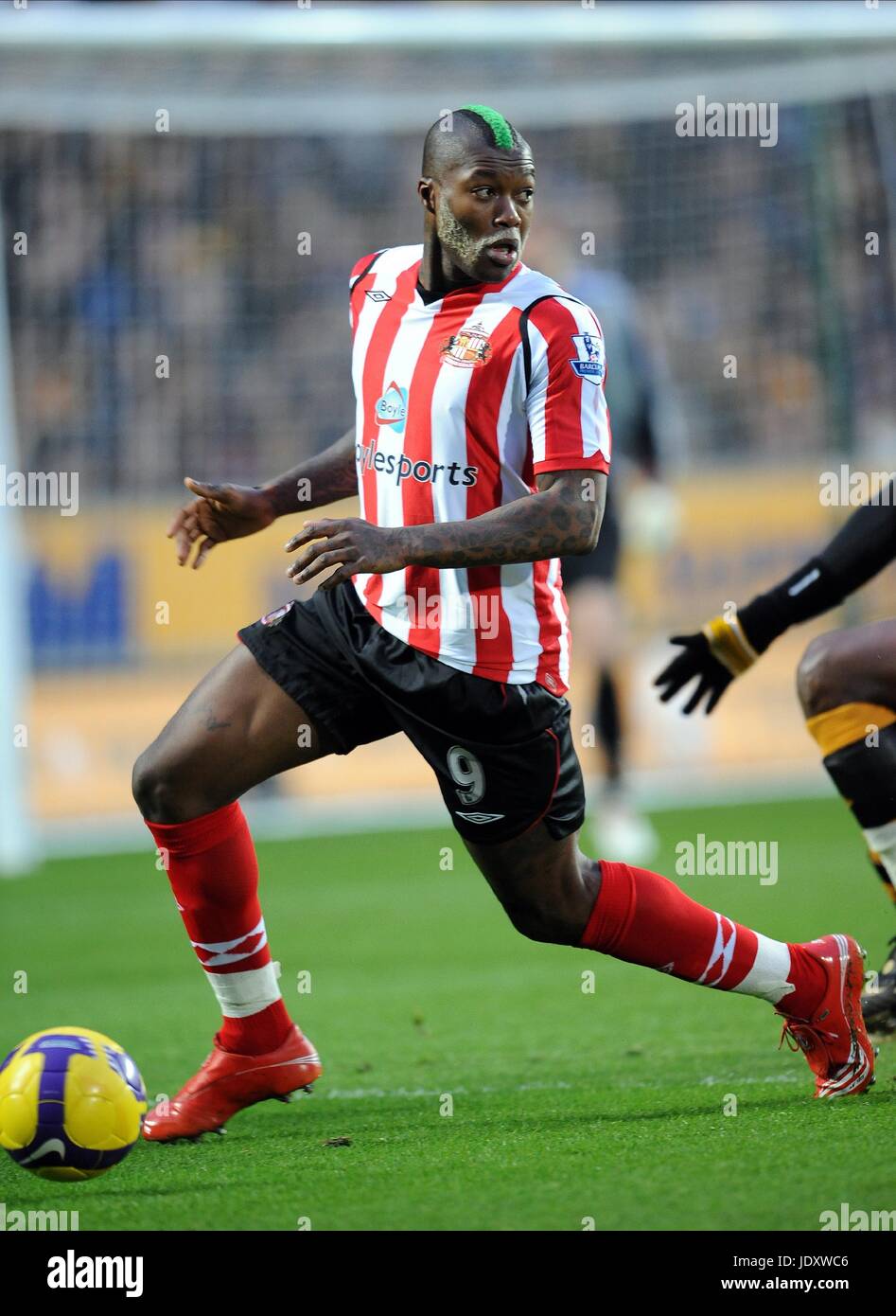 DJIBRIL CISSÉ mit grünen Haaren Rumpf V SUNDERLAND KC STADIUM HULL ENGLAND 20. Dezember 2008 Stockfoto