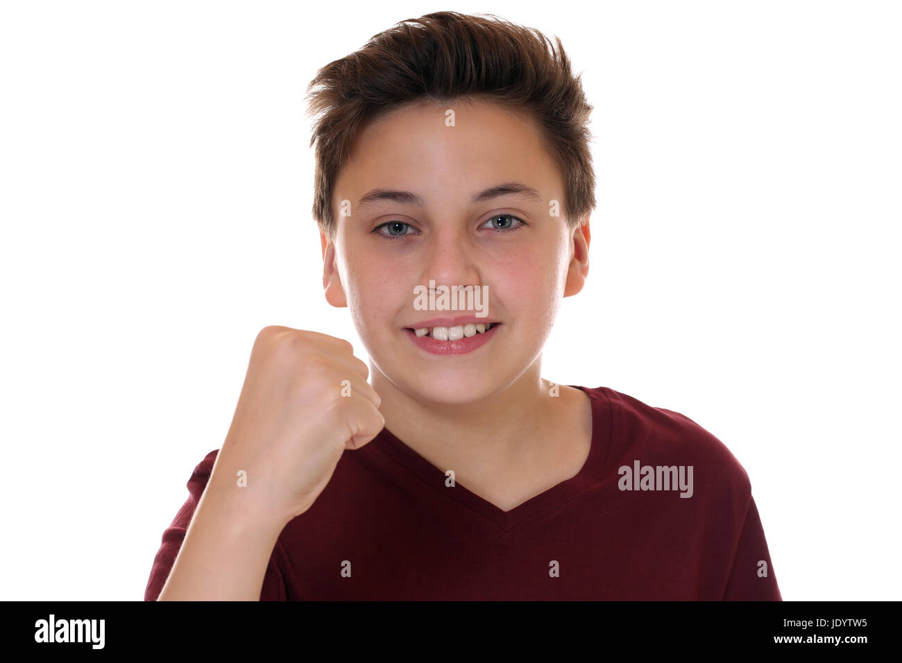 Junge Ballt Die Faust Mit Erfolg Beim Siegen Oder Gewinnen, Isoliert Vor Einem Weissen Hintergrund Stockfoto