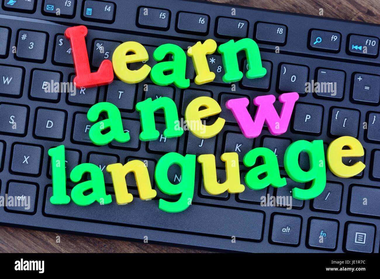 Lerne eine neue Sprache Wörter auf Computer Tastatur Nahaufnahme Stockfoto