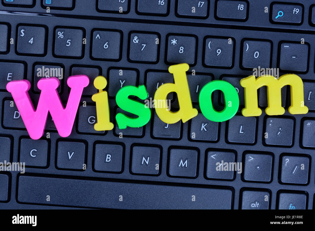 Wort der Weisheit auf Computer Tastatur Nahaufnahme Stockfoto