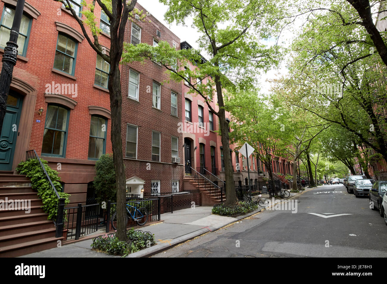 Reihenhäuser aus rotem Backstein auf Charles Street Greenwich Village, New York City USA Stockfoto