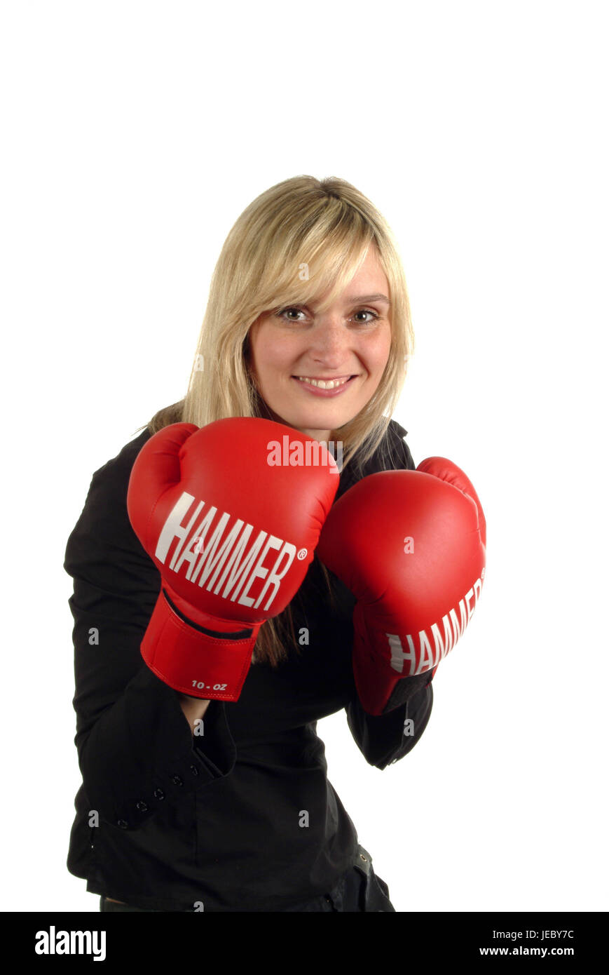 Junge Frau mit Boxhandschuhen Stockfoto