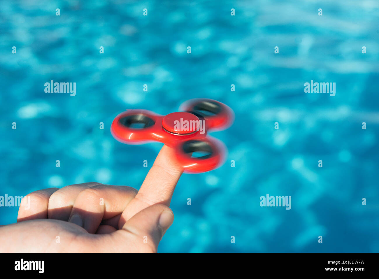 Finger balancieren Fidget spinner Stockfoto