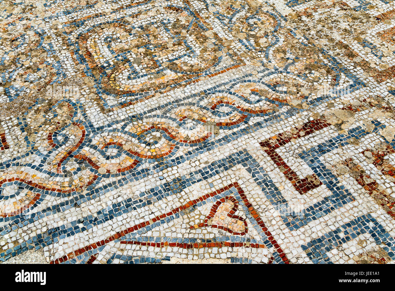 Herz-Detail des antiken Mosaik auf der Straße Roman Archaeological Site von Ephesus in der Türkei. Stockfoto