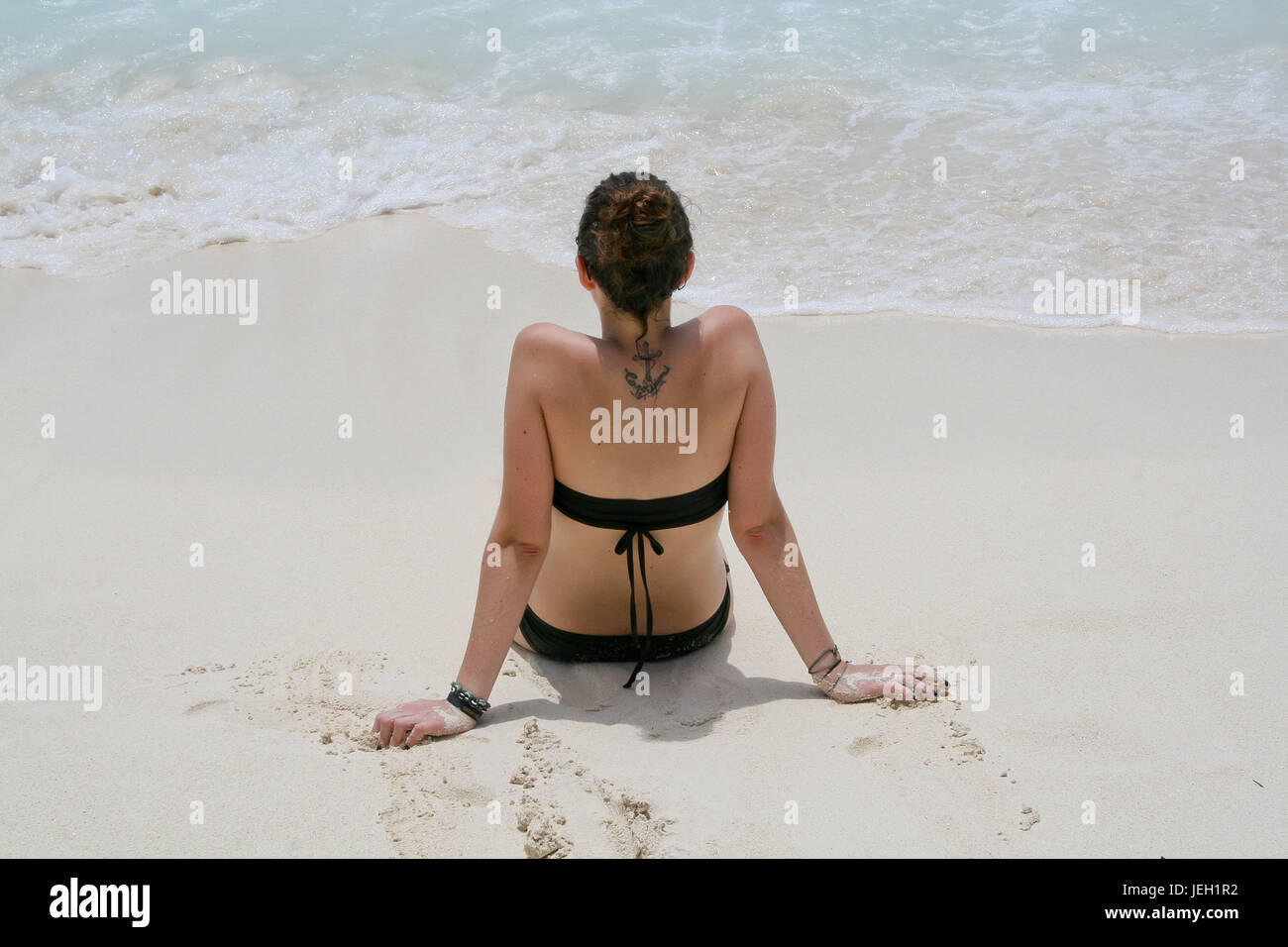 Frau im Schwimmbad Stockfoto