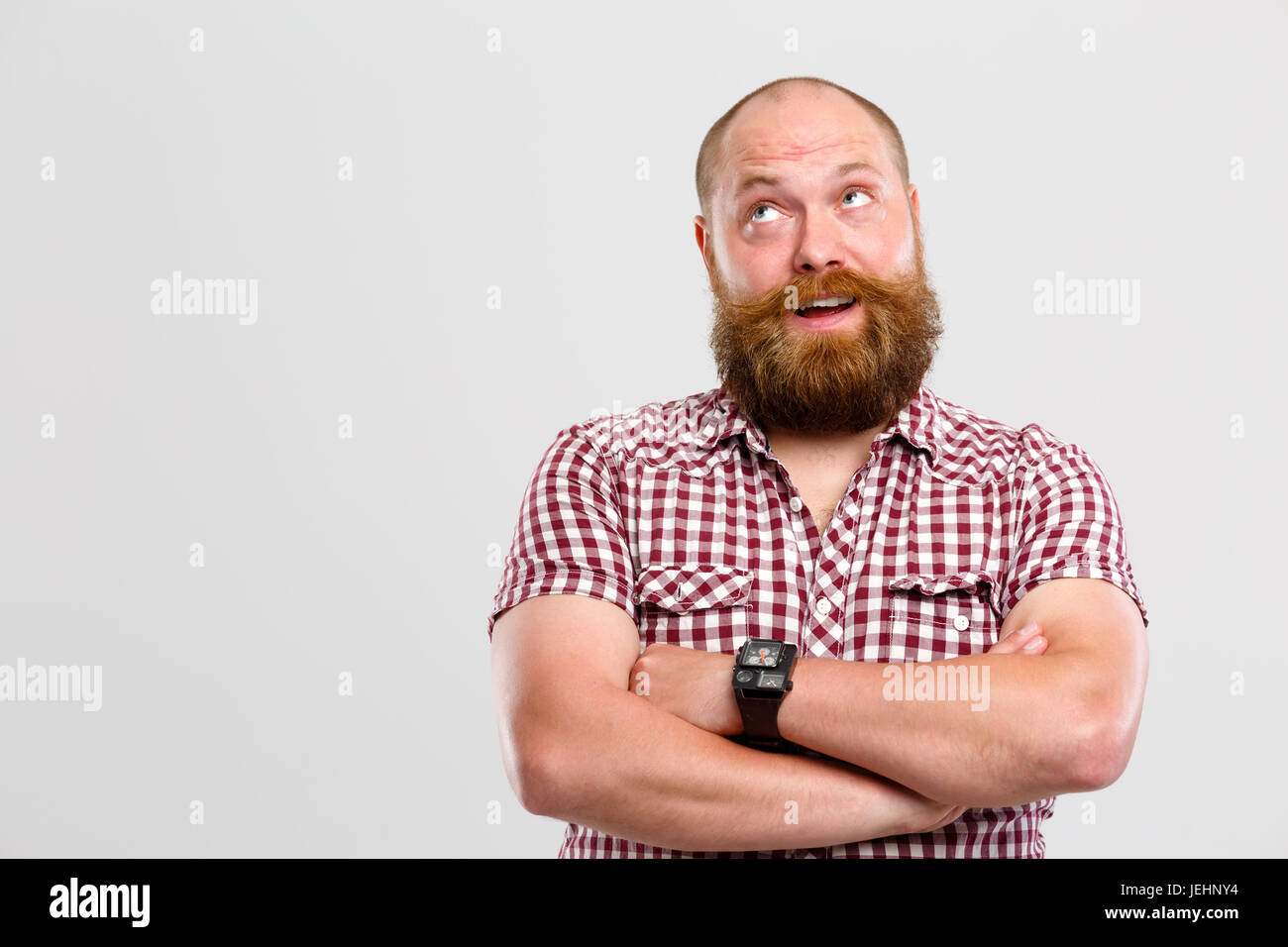 Nachdenklicher Mann mit Ingwer Bart Stockfoto