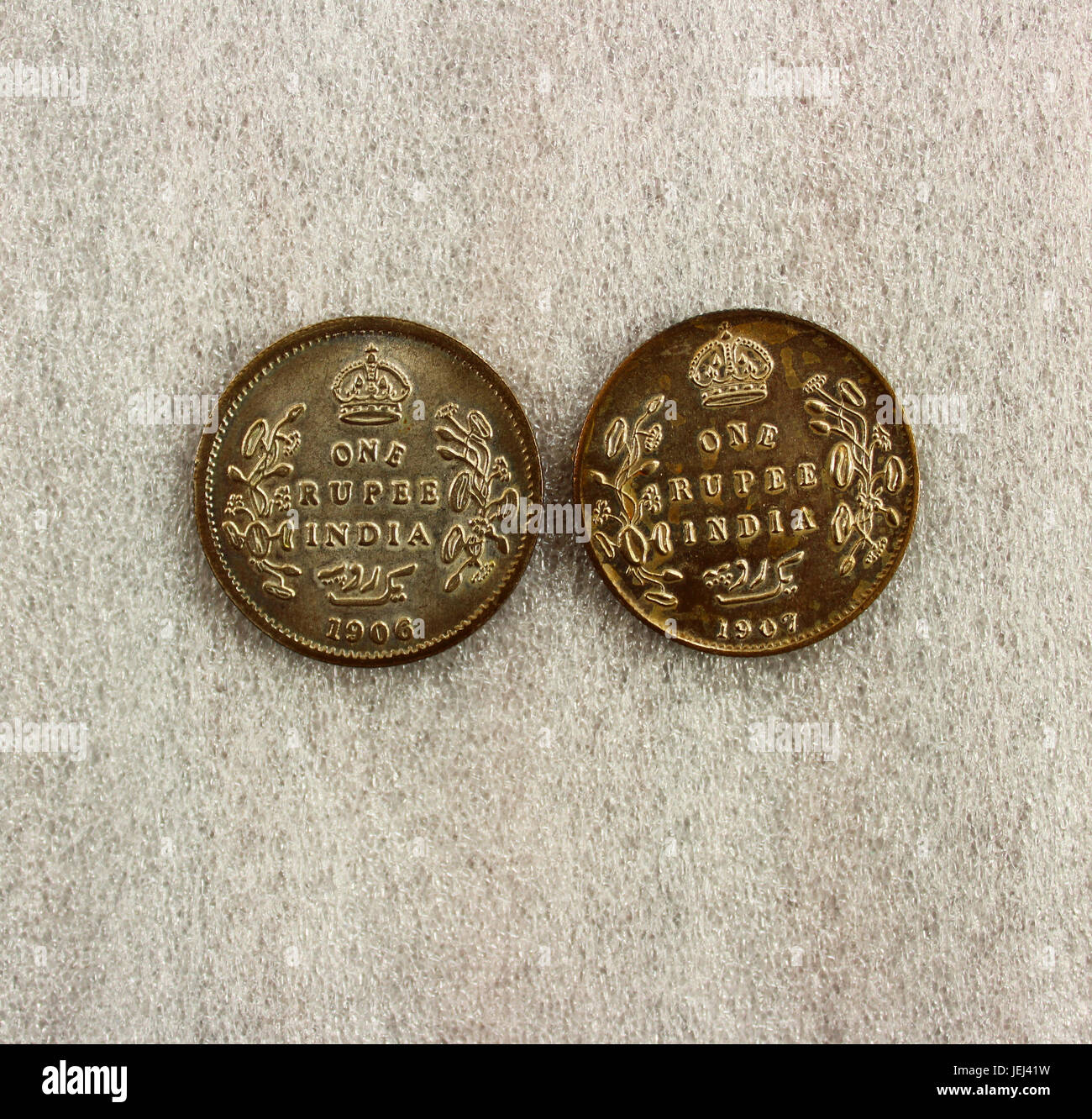 Alte indische eine Rupie-Münzen aus der britischen Kolonialzeit Stockfoto