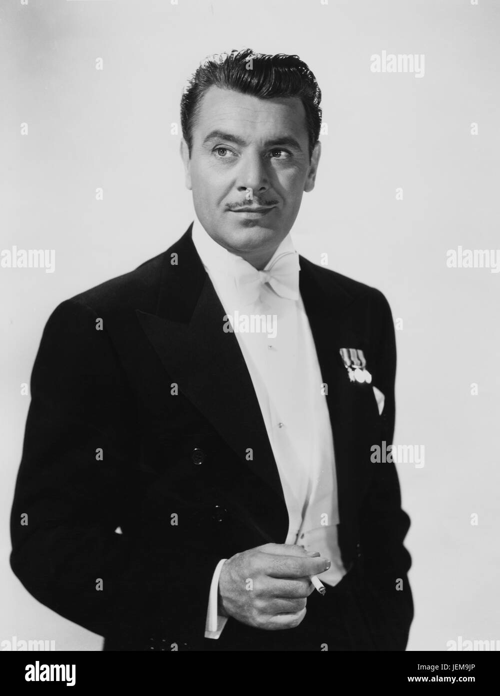 George Brent, Portrait Werbung für den Film, "Der Regen kam", 20th Century Fox, 1939 Stockfoto