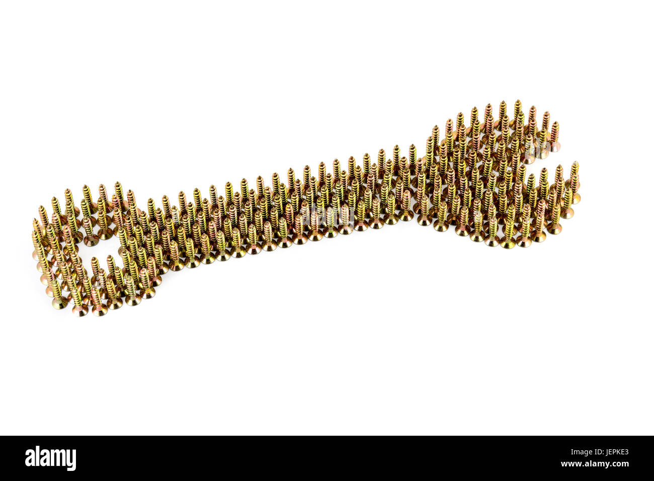Doppelseitige Schraubenschlüssel angelegt auf weiß mit goldenen galvanisierter selbst-Anzapfungen isoliert auf weißem Hintergrund Stockfoto