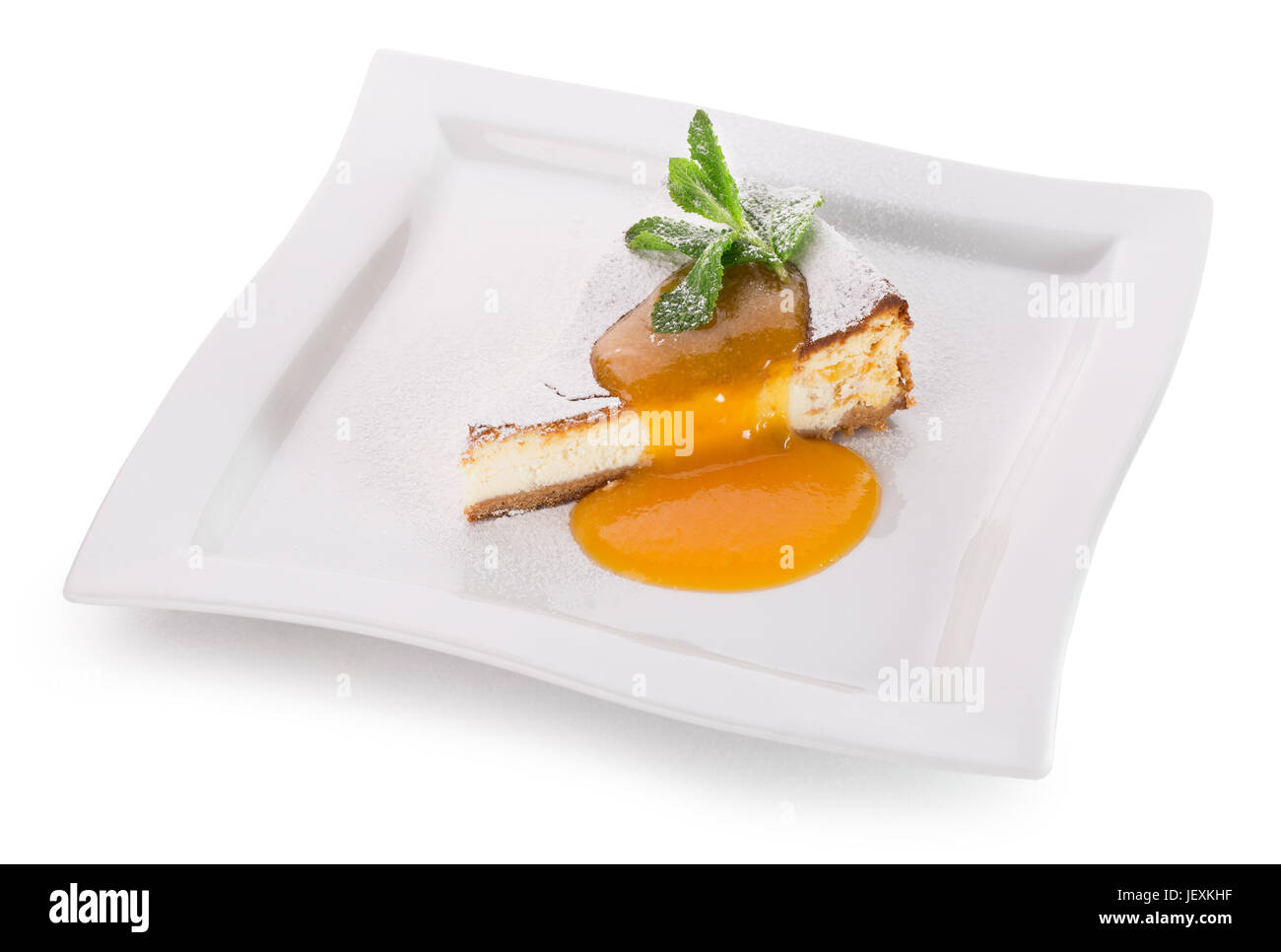 Stück Käsekuchen mit Pfirsich. Stockfoto