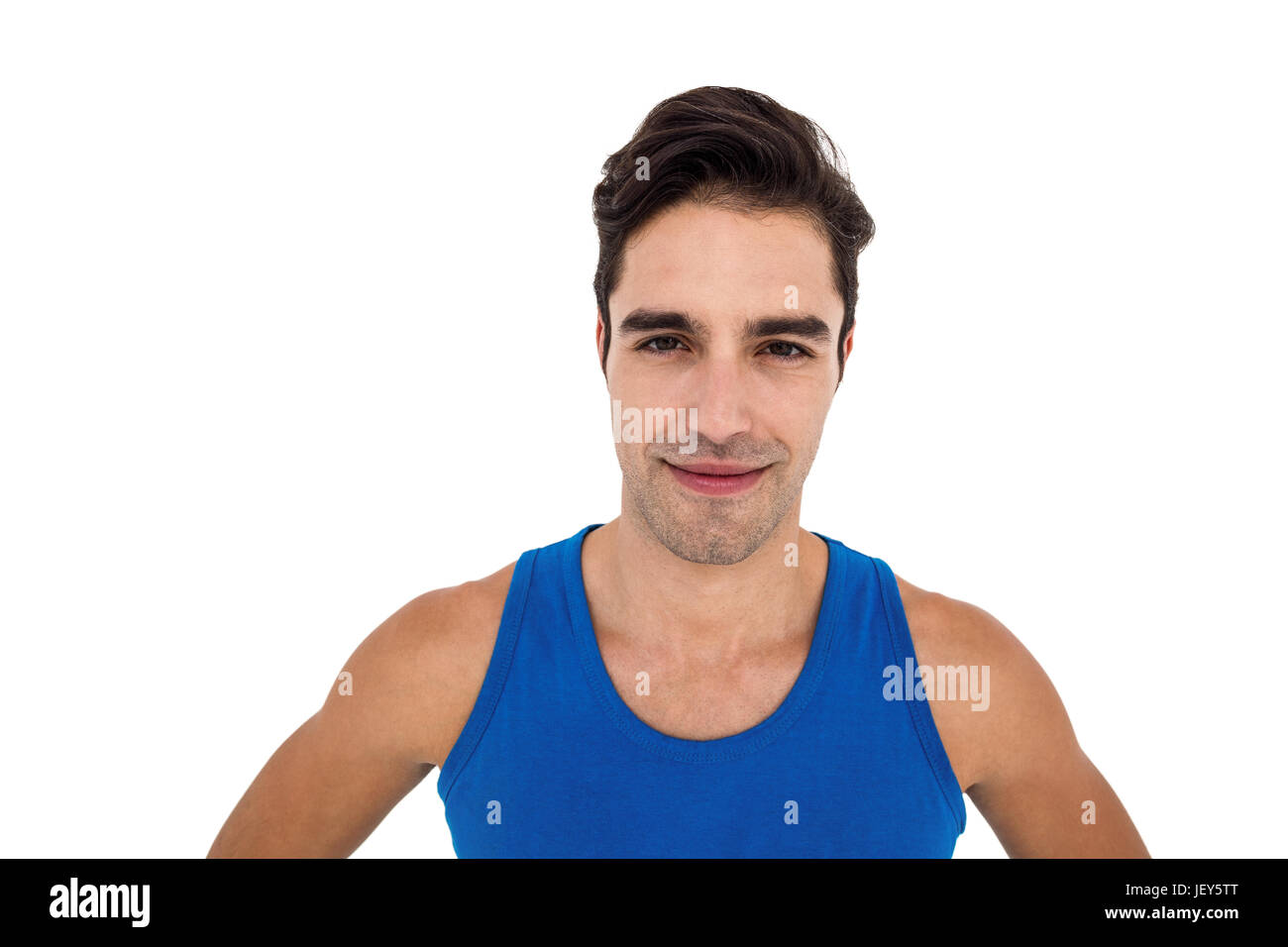 Männlicher Athlet posiert auf weißem Hintergrund Stockfoto