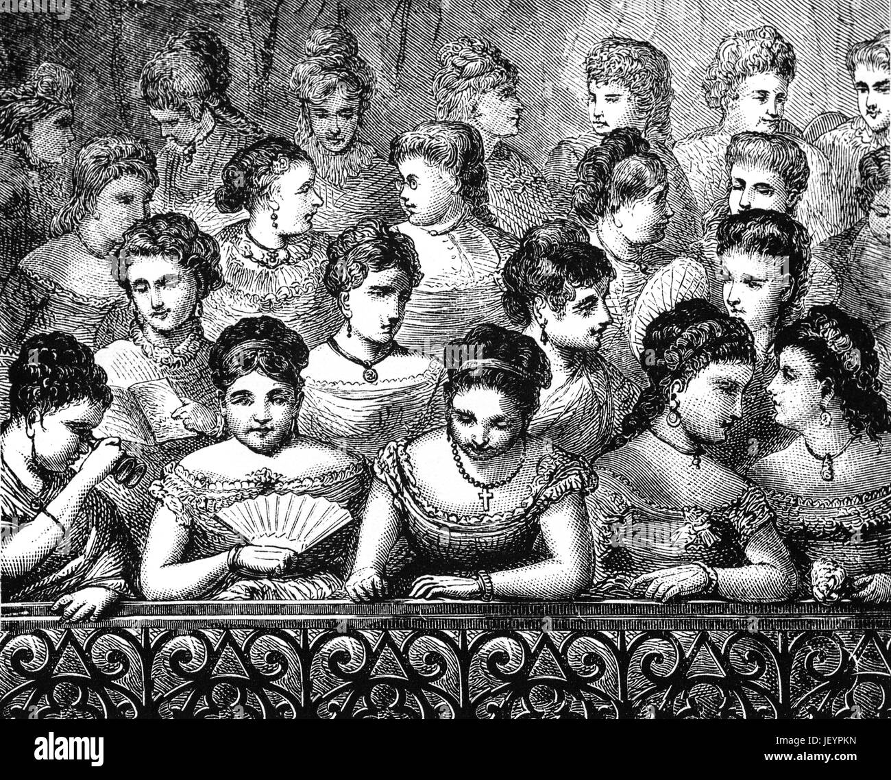 1879: ein Publikum von Damen in der großen Ebene des New Orleans Opera House während Karneval Karneval, New Orleans, Louisiana, Vereinigte Staaten von Amerika Stockfoto