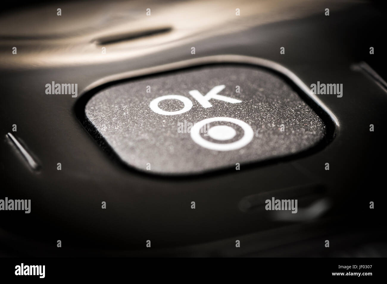 Schaltfläche "OK" auf der Fernbedienung, TV und Video. Stockfoto